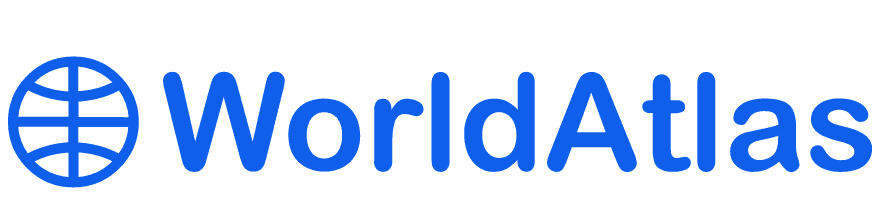 The image shows the logo for WorldAtlas. It includes an icon of a globe on the left, consisting of intersecting lines forming a spherical shape, followed by the text "WorldAtlas" in a blue, bold, sans-serif font.